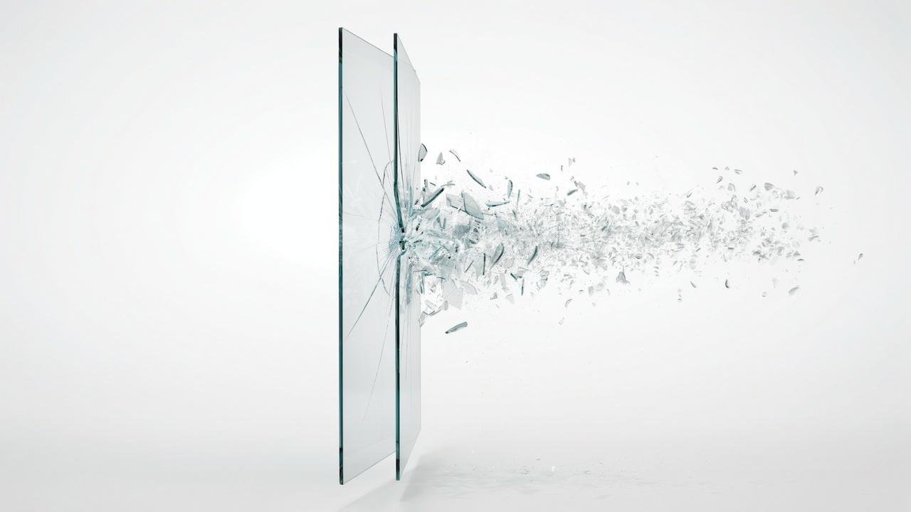Tempered glass shattering into small safe pieces.