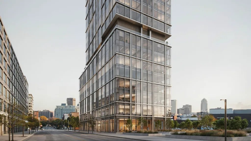 Modern building with glass curtain wall system and sleek aluminum framing.