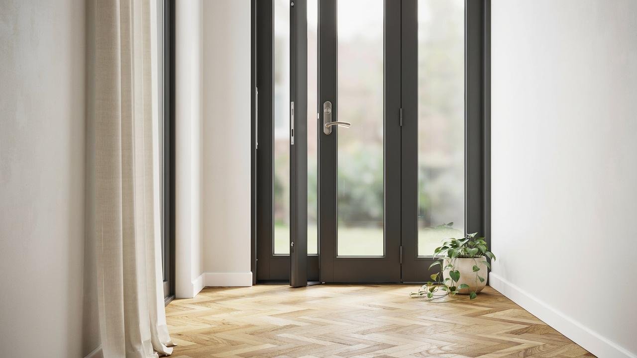 French doors equipped with modern high-security locks and reinforced locking mechanisms.